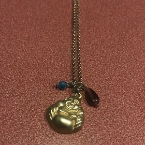 Really cute Buddha necklace with two additional charms it is “28”